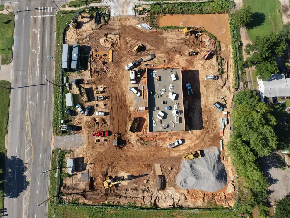Aerial view from the street with the store building and tank area