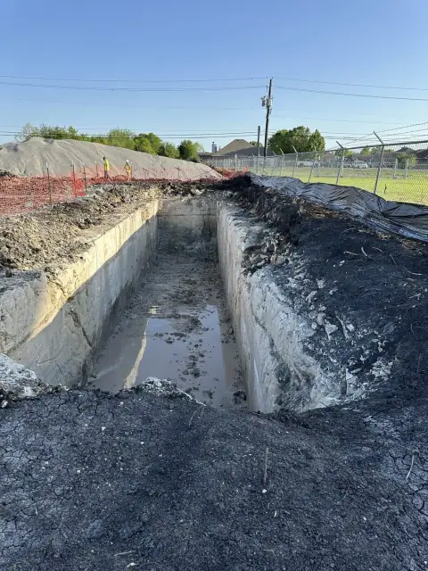 Rock excavation with dewatering underway
