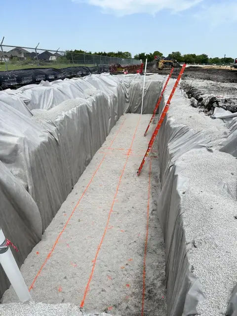 Lined tank excavation with tank positions marked