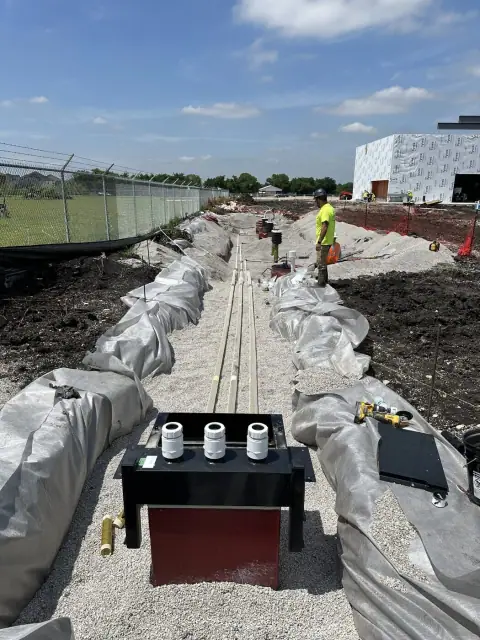 Piping trench running toward the dispenser islands