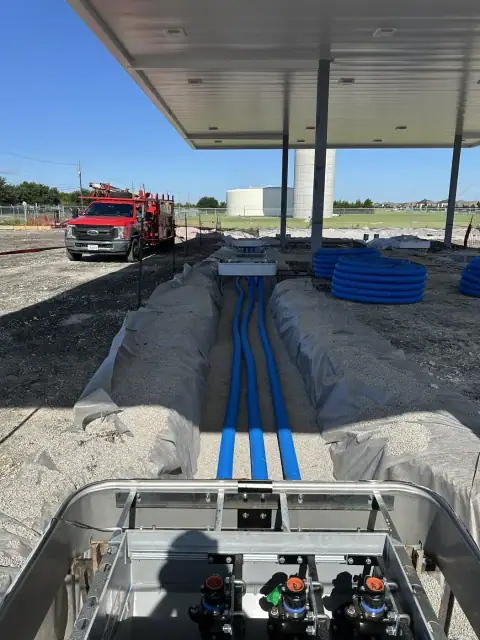 Dispenser sump with product piping entering