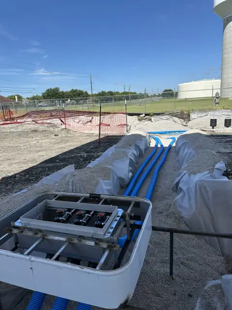 Under-dispenser containment sump with flexible product piping