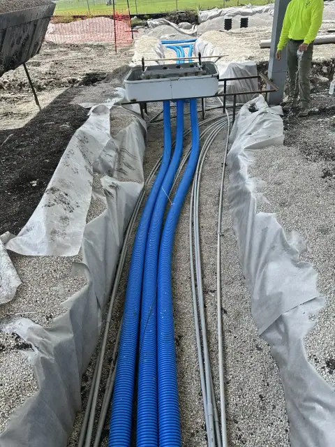Product piping run in the trench toward the dispensers