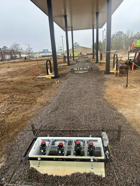 Dispenser sump connections under the canopy