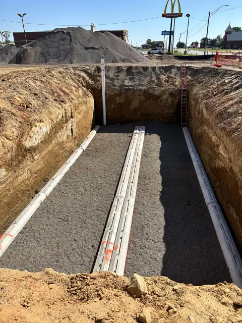Tank pit with anchors set in the bedding