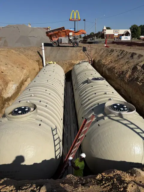 Tanks set in the pit with the crew working between them
