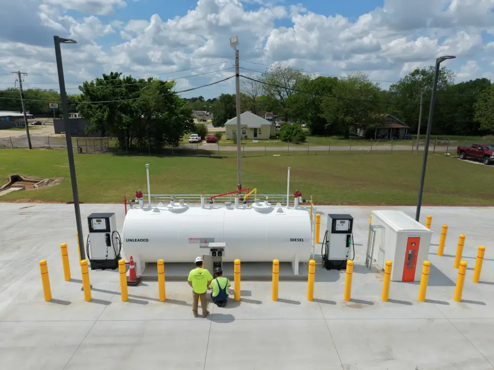 Completed split aboveground tank with two dispensers, bollards and fuel-management equipment