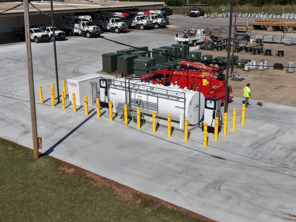 Completed fuel island with bollards beside the service yard