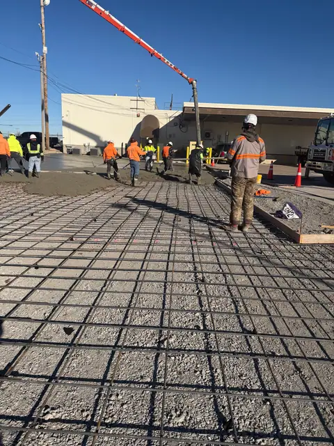Crew pumping and placing concrete