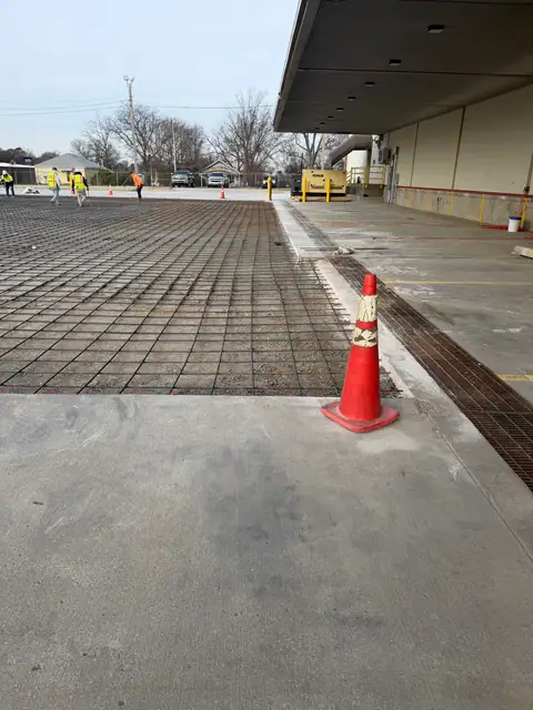 Finished concrete meeting the next reinforced section