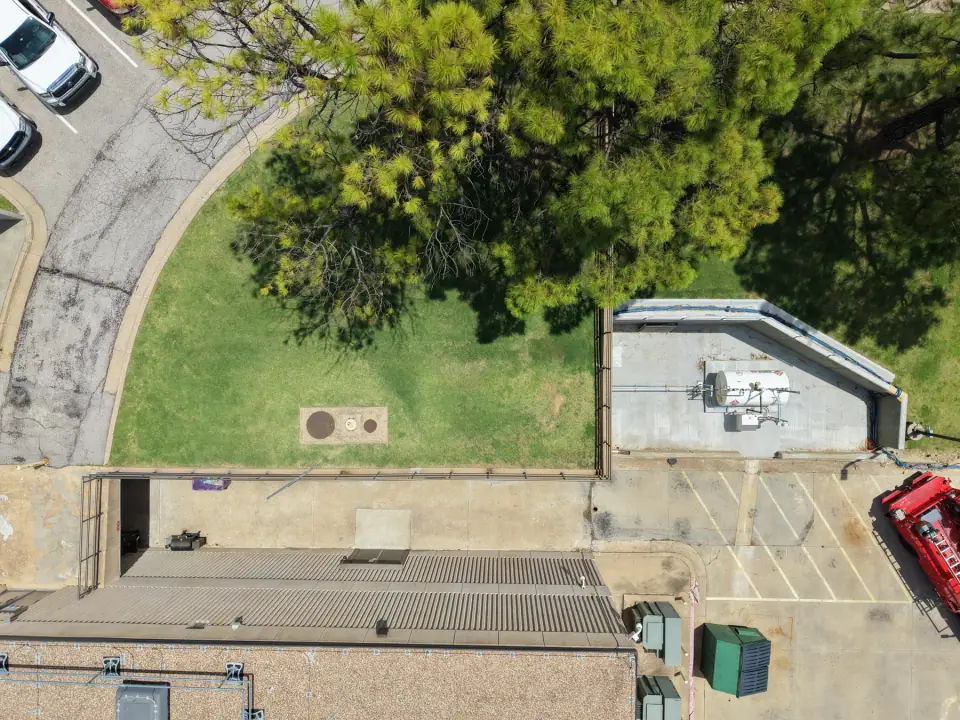 Aerial view of the containment area beside the building
