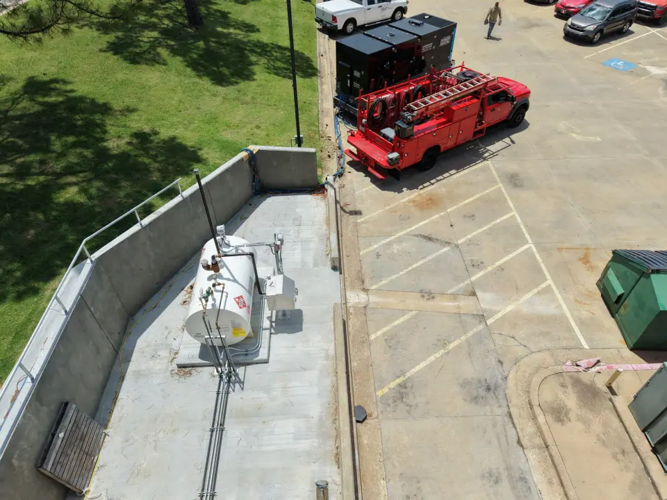 Overhead view of the tank installation with the service truck nearby