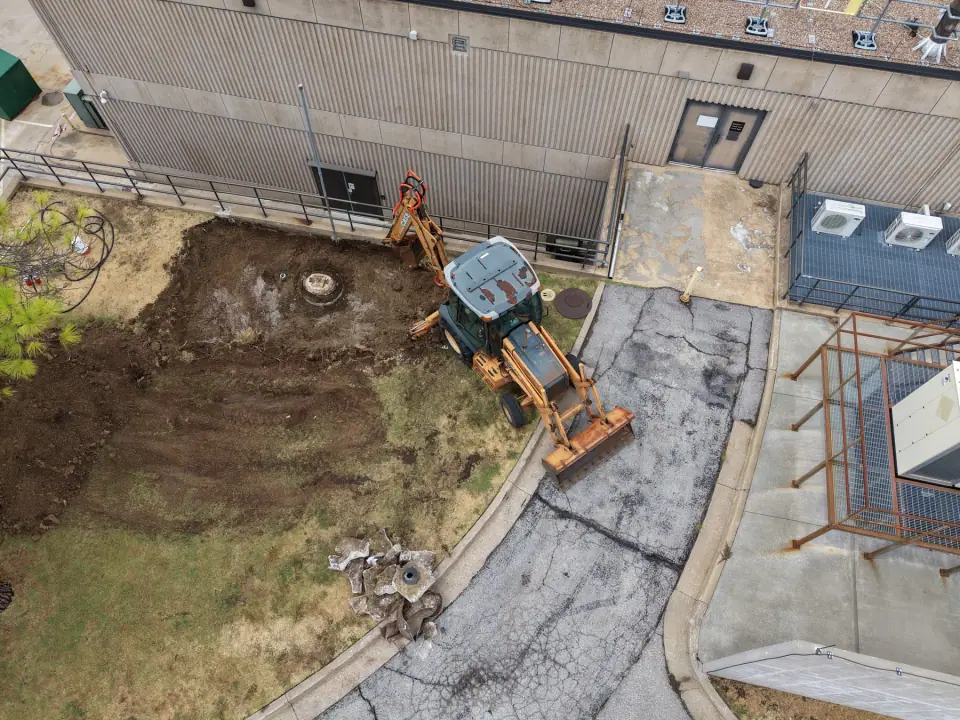 Excavation for the tank removal beside the building